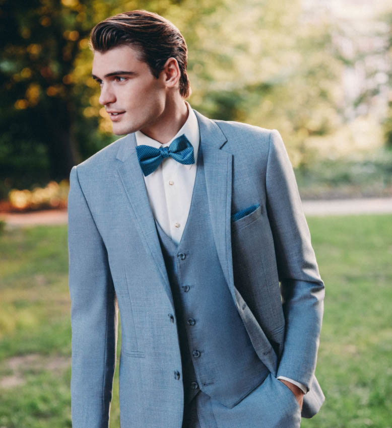 Model wearing a Tuxedos gown